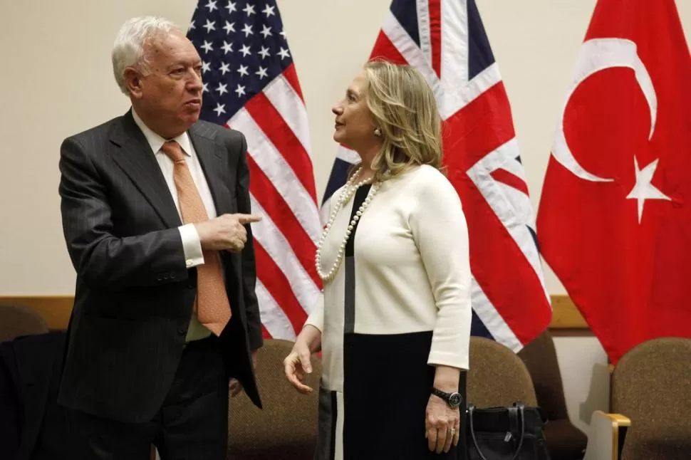 EN BRUSELAS. García-Margallo trató ayer de buscar el respaldo de EEUU, a través de Hillary Clinton, contra la decisión de argentina de avanzar sobre Repsol. AFP