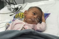 Morena viajó en un avión común; iba en mis brazos porque no había incubadora