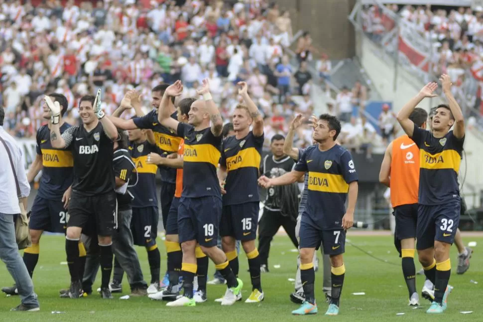 PURA ALEGRÍA. Los jugadores de Boca celebraron el empate como un triunfo. DYN