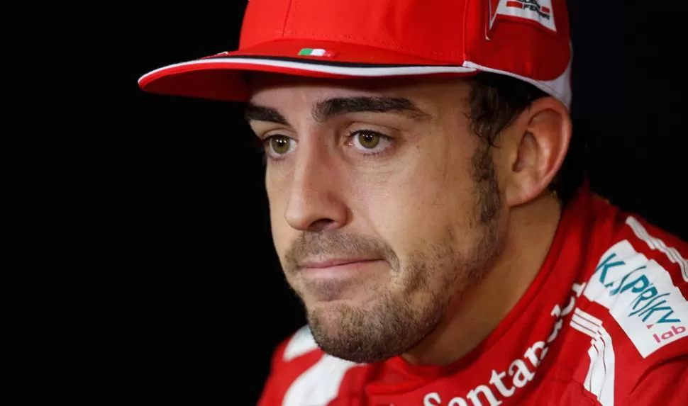 ESPERA. El español Fernando Alonso todavía sueña con alcanzar su tercer campeonato mundial de pilotos. REUTERS