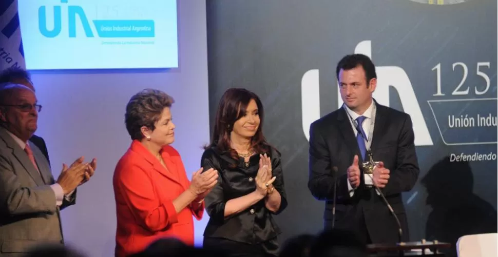 OTRA VEZ JUNTAS. Las presidentas participaron, los últimos días de noviembre, de la Conferencia Industrial, en Los Cardales (Buenos Aires). DYN