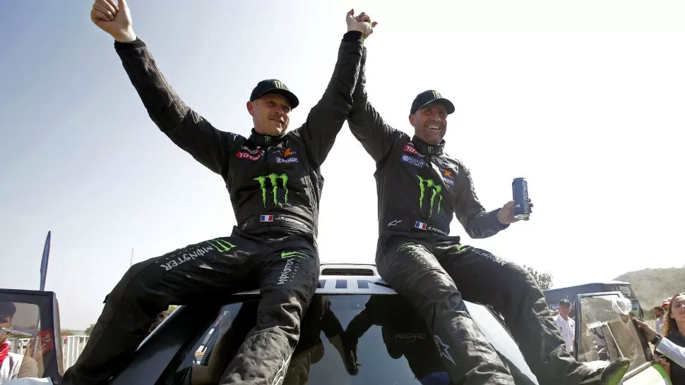 MULTICAMPEON. El francés Peterhansel festejó por undécima vez al final de un Dakar, con seis triunfos en motos, y el quinto entre los autos. REUTERS