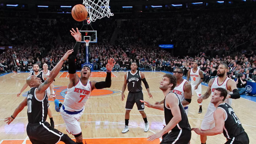 NO ALCANZO. Los 29 puntos de Carmelo Anthony lo dejaron al tope de los goleadores pero no impidieron la caída de los Knicks. REUTERS