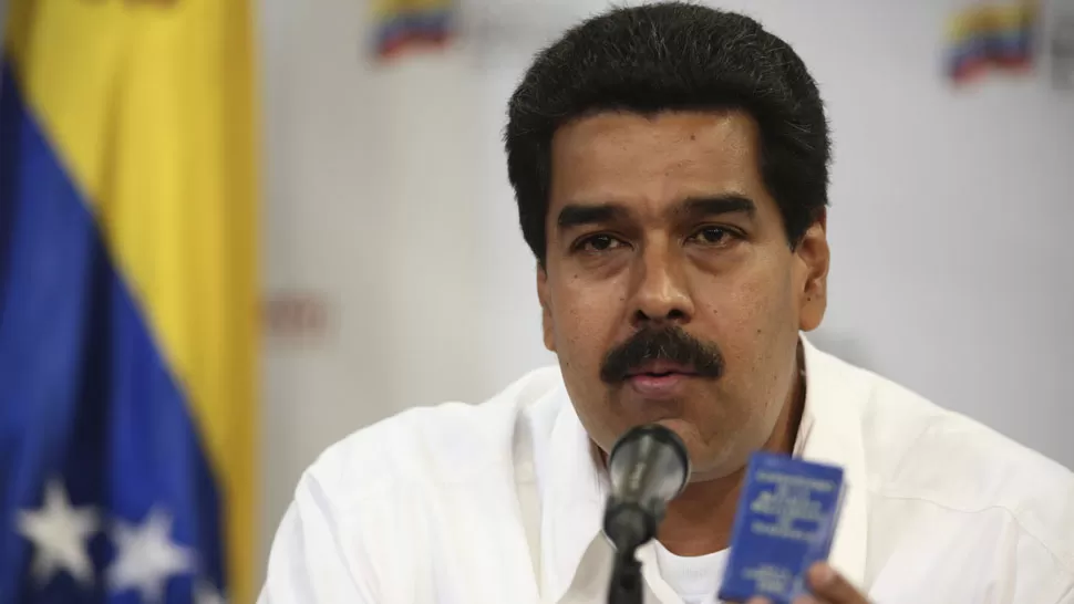 CONSPIRACION. Horas antes de anunciar la muerte de Chávez, Maduro dijo que al presidente de Venezuela le inocularon el cáncer. REUTERS