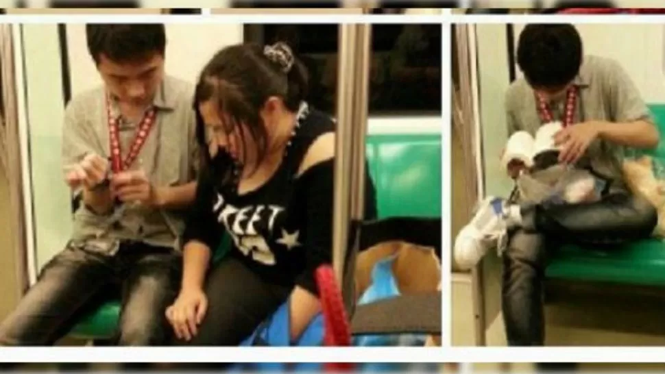 JUNTOS. La pareja en el metro de China. FOTO TOMADA SPDNOTICIAS.COM