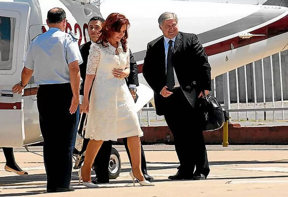 CON CRISTINA. Muñoz, bolso en mano, sonreía al lado de la Presidenta. PERFIL.COM