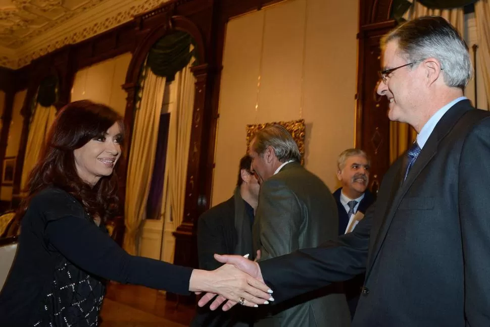 CONVENIO COMERCIAL. La presidenta Fernández cerró el acuerdo con Watson, el CEO de Chevron. DYN
