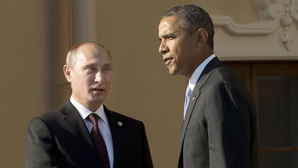 PARA LA FOTO. Más allá de los saludos cordiales, Putin y Obama no se ponen de acuerdo sobre cómo encarar la crisis siria. REUTERS