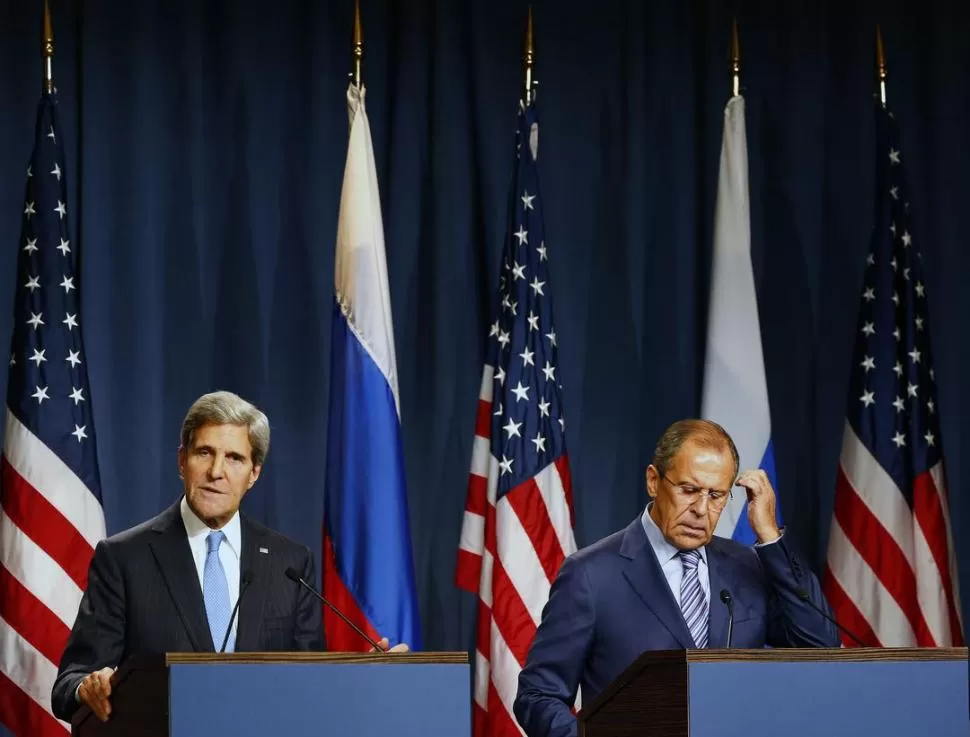 CUMBRE DE DIPLOMÁTICOS. El norteamericano Kerry y el ruso Lavrov se reunieron ayer para definir las condiciones del retiro de armas de Siria. REUTERS