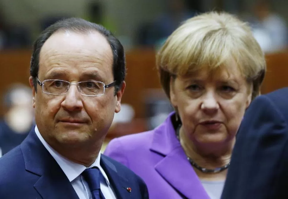EXPECTANTES. Hollande y Merkel mostraron su malestar en contra de EEUU. REUTERS