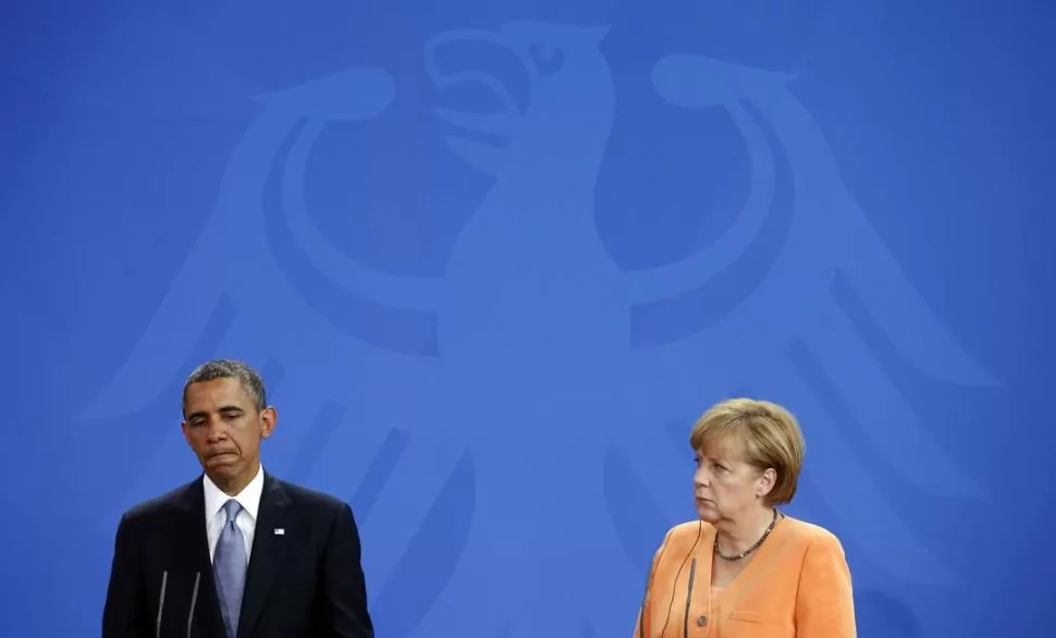 EN TIEMPOS DE PAZ. En junio, Obama visitó a Merkel en Alemania. En ese entonces, estaba lejos de destaparse el escándalo de la escucha a la canciller. REUTERS