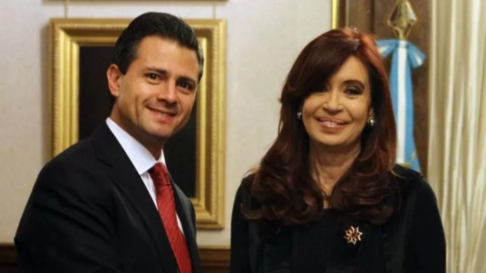 JUNTOS. La presidenta Cristina Kirchner junto a su par mexicano, Enrique Peña Nieto. ARCHIVO