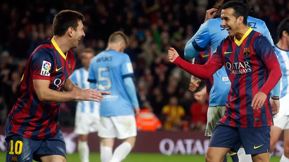 FESTEJO. Leo Messi celebra uno de los goles del Barcelona. REUTERS. 
