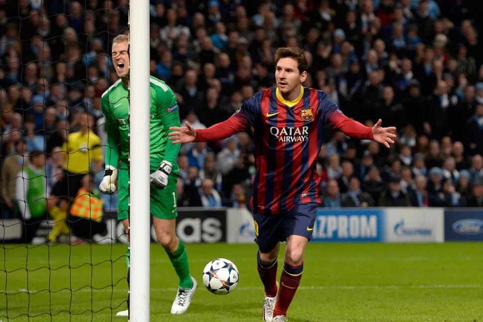 DOS CARAS. Messi festeja y Hart se lamenta por el gol del argentino. REUTERS