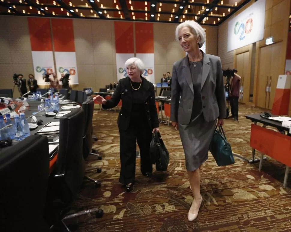 DOS POTENCIAS. Yellen, presidenta de la FED, y Lagarde, titular del FMI. REUTERS