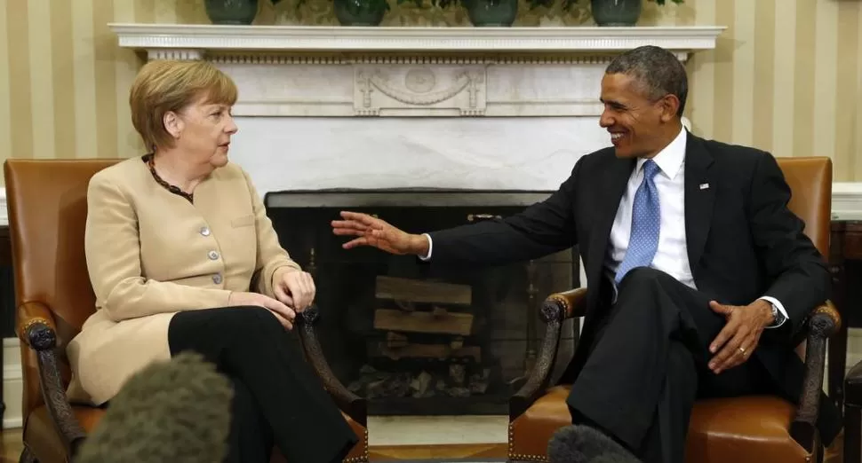 EN LA CASA BLANCA. Ángela Merkel dialoga con Barack Obama. reuters