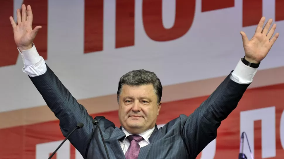 AMPLIA CONVOCATORIA. Petro Poroshenko habría ganado por más del 50% de los votos. FOTO TOMADA  DE SCMP.COM