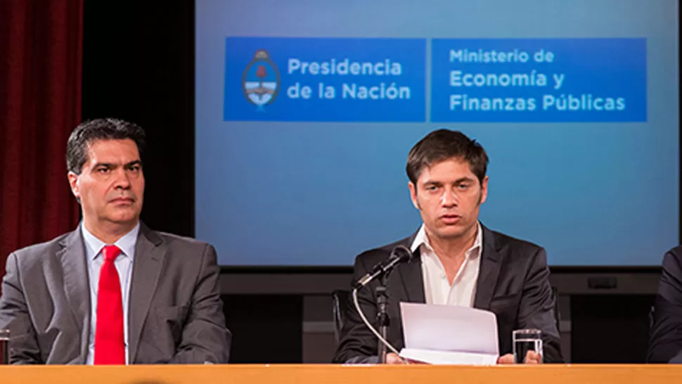 VOCEROS. Capitanich y Kicillof durante una conferencia de prensa. FOTO TOMADA DE MECON.GOV.AR