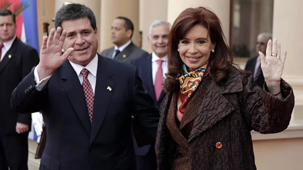 VISITA OFICIAL. Cristina Fernández, junto al presidente de Paraguay, Horacio Cartes. REUTERS