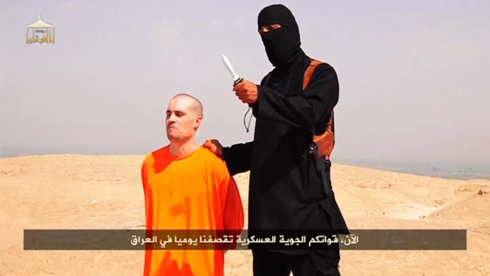 INSTANTE FINAL. Foley fue obligado a dar un mensaje antes de ser decapitado. REUTERS