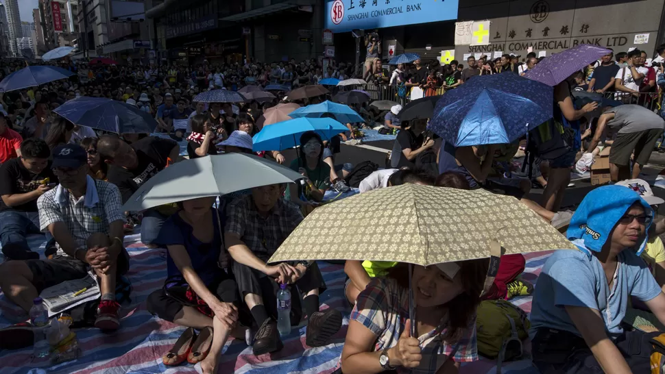EN LAS CALLES. Las protestas presionan al gobierno chino. REUTERS