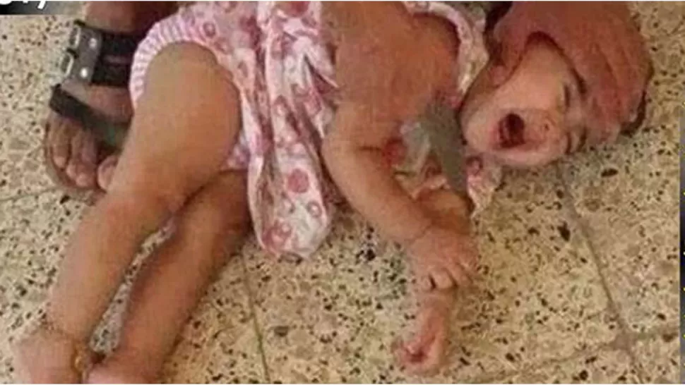 EL TERROR. La bebé pide ayuda mientras alguien la amenaza con un cuchillo. FOTO DE INFOBAE.COM