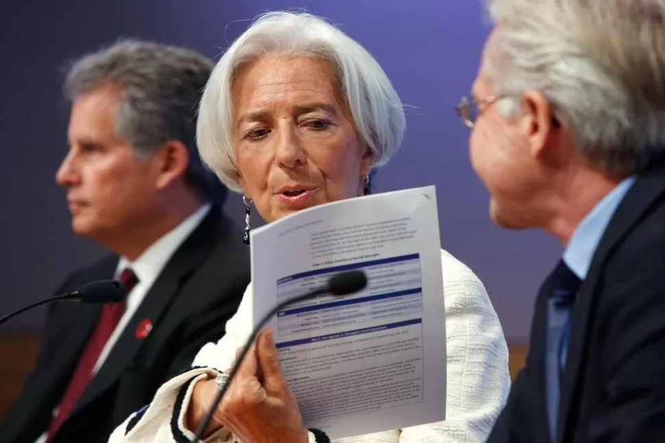 MALA NOTA. El FMI, que conduce Christine Lagarde, rebajó las perspectivas para la Argentina. reuters