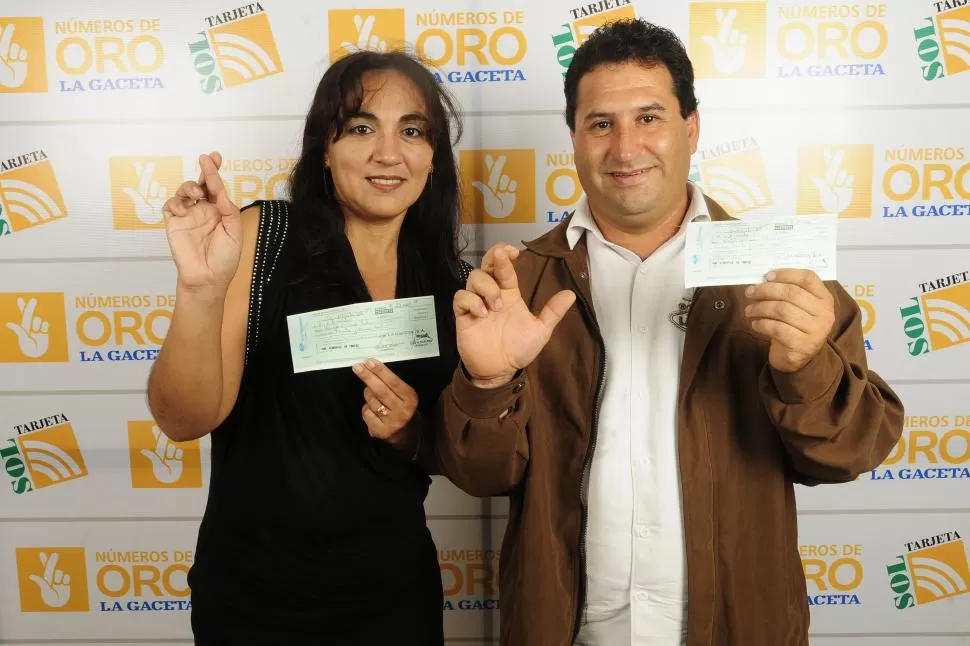 COMPARTIR SUERTE. Karina Lobo y Martín Olea cobraron sus premios la gaceta / foto de Analía Jaramillo