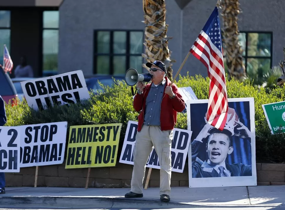 PROTESTA. Manifestantes se oponen a la amnistía, en Las Vegas. reuters