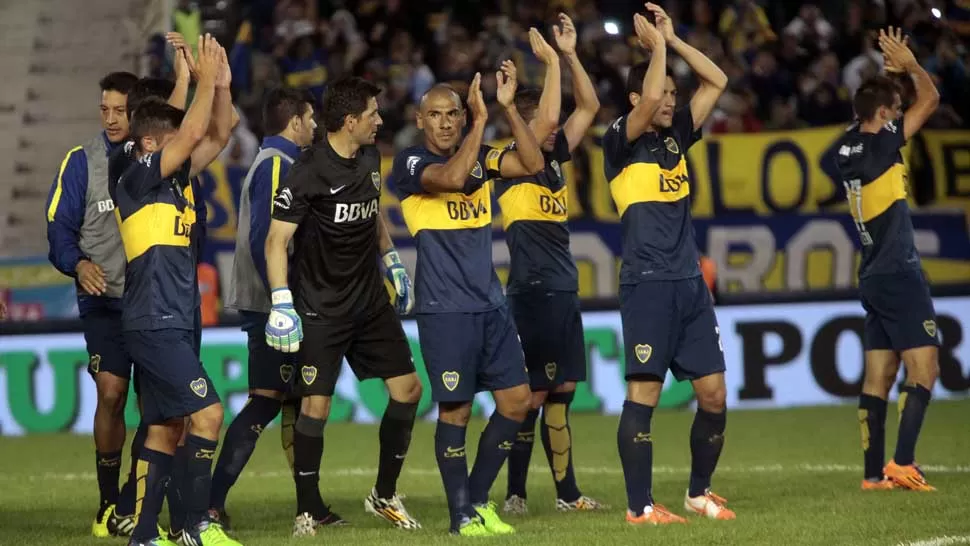 PURAS SONRISAS. Boca, al vencer a Vélez en Mar del Plata, sacó pasaje para jugar la Copa Libertadores 2015.