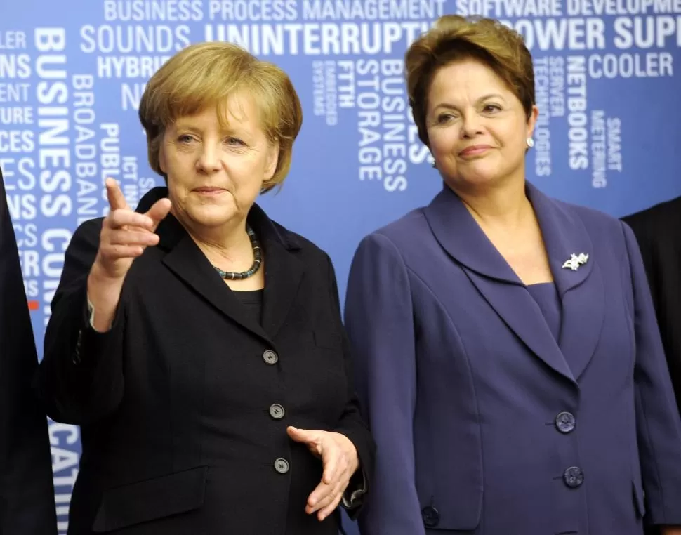 MUJERES FUERTES. Merkel y Dilma darán más impulso a la buena relación que existe entre ambas naciones. reuters (archivo)