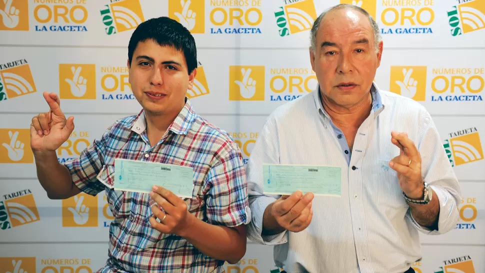 CON EL CHEQUE EN LA MANO. Luis Fernando Martino y José Horacio Ramos cobraron el premio.
