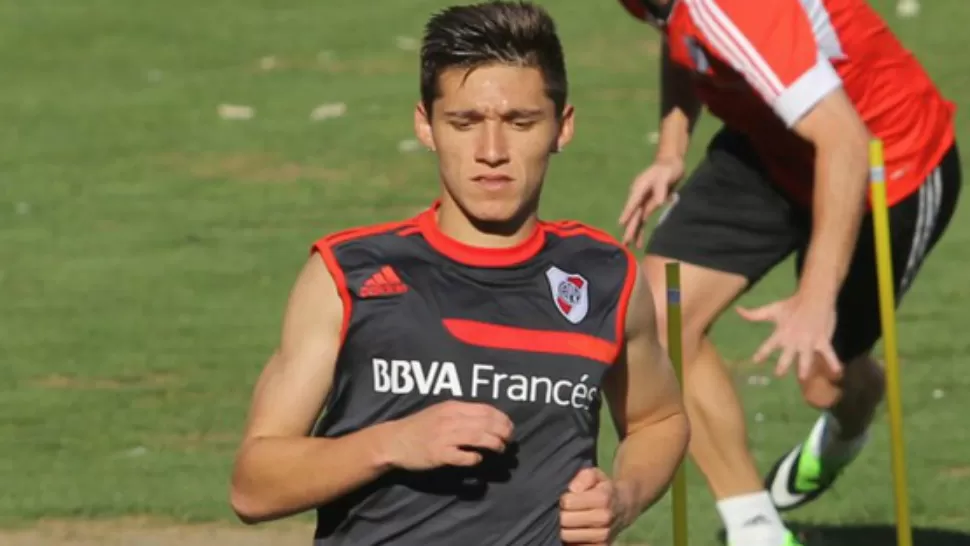 VUELTA AL TRABAJO.  Los futbolistas Leonel Vangioni y Matías Kranevitter retomaron hoy el trabajo junto al plantel de River tras superar los efectos de la agresión que sufrieron el pasado jueves durante el Superclásico.