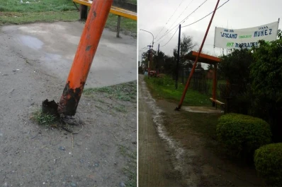 Un poste de alumbrado cuelga de los cables