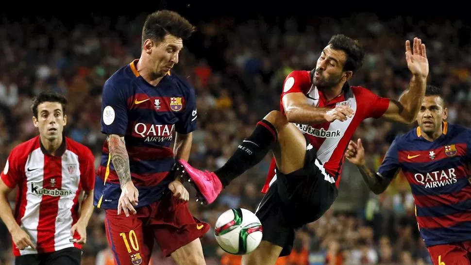 NO PUDO PASAR. Bilbao controló bien a Messi y compañía y se coronó campeón. (REUTERS)