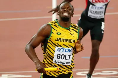 Bolt consiguió su triplete dorado en Pekín
