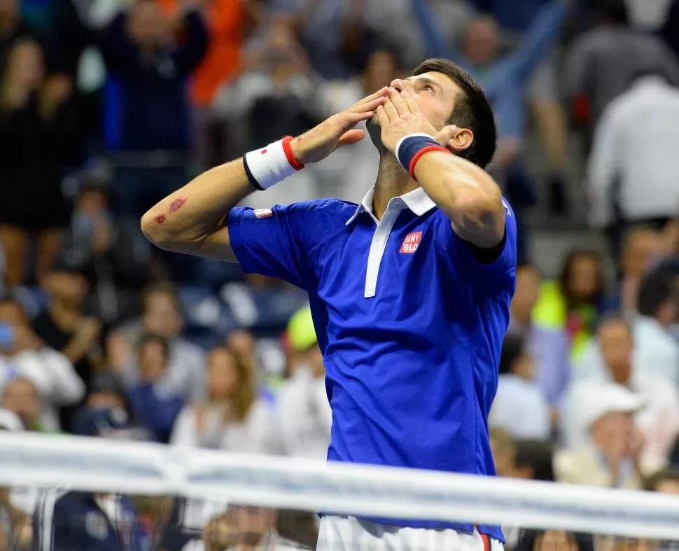 TERCER BESO. Como en Australia e Inglaterra, Djokovic ganó otro major en el año. reuters