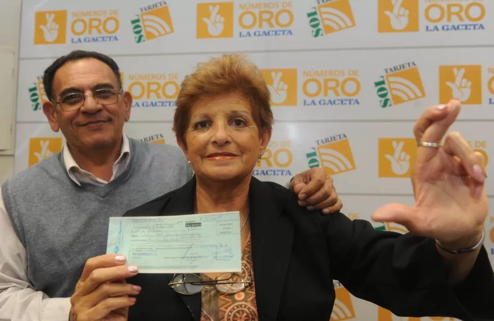 CON GUARDAESPALDAS. La ganadora junto a su marido, Héctor. LA GACETA / FOTO DE ANTONIO FERRONI