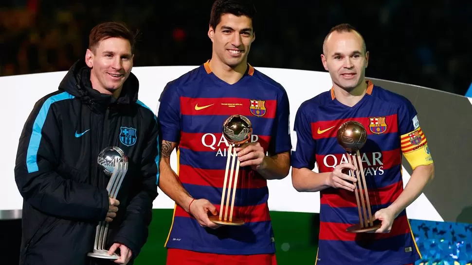 LOS MEJORES. Messi, Suárez e Iniesta fueron elegidos como los más destacados del Mundial de Clubes. REUTERS