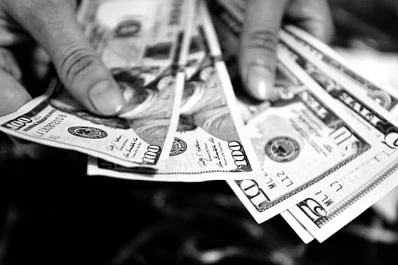 La AFIP comenzó a reintegrar las retenciones por la compra de dólares