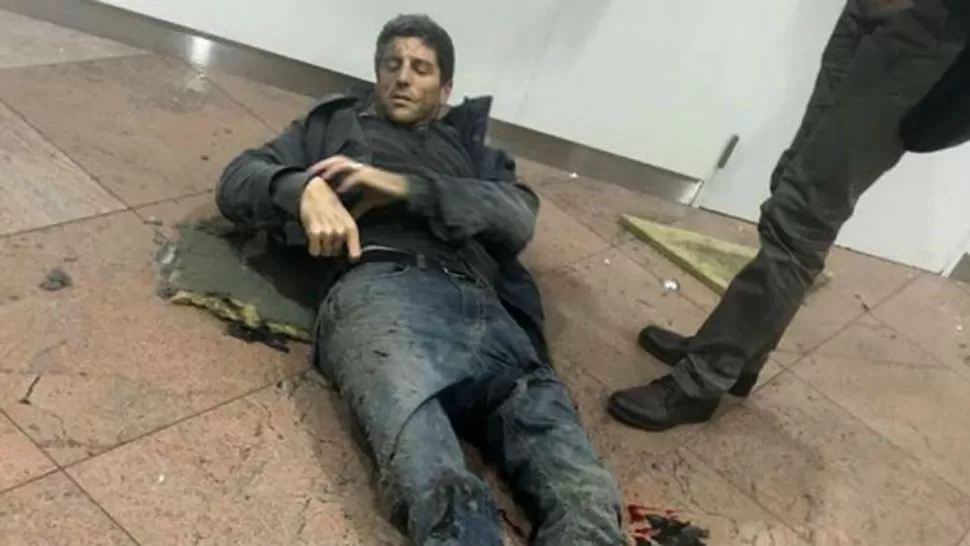 Ataques en Bruselas: la foto del deportista herido que conmociona al mundo