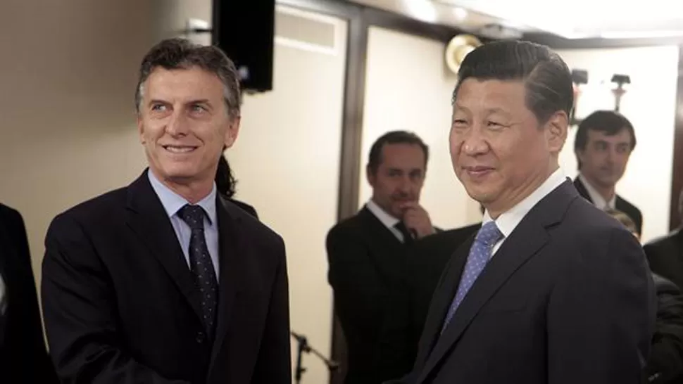 MACRI Y XI JINPING. Ambos mandatarios se encontraron en 2014, cuando el argentino era jefe de Gobierno porteño. ARCHIVO