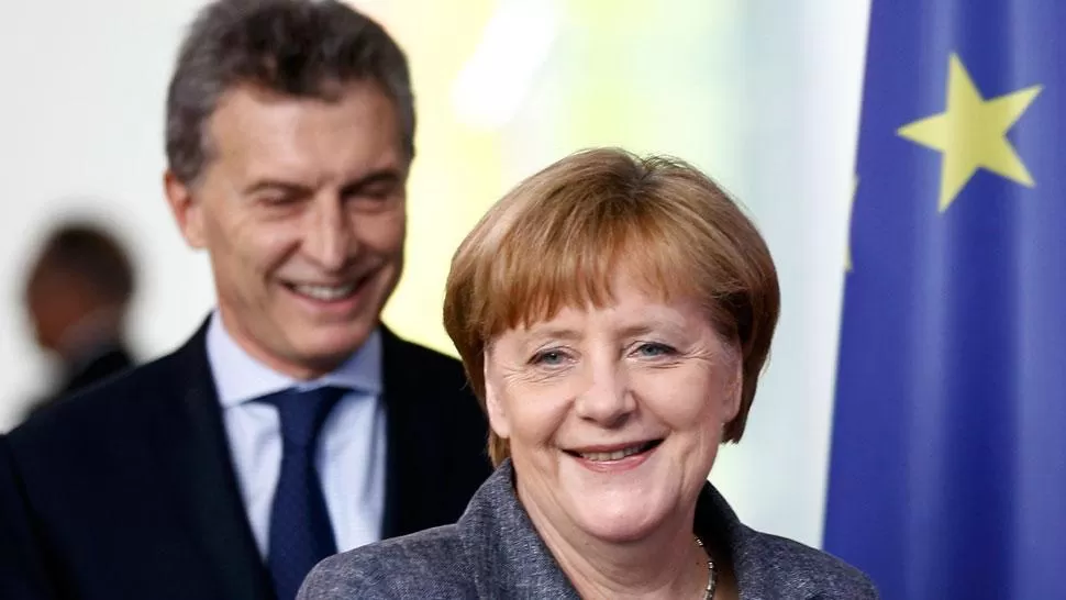 MANDATARIOS. Macri y Merkel en Alemania. REUTERS