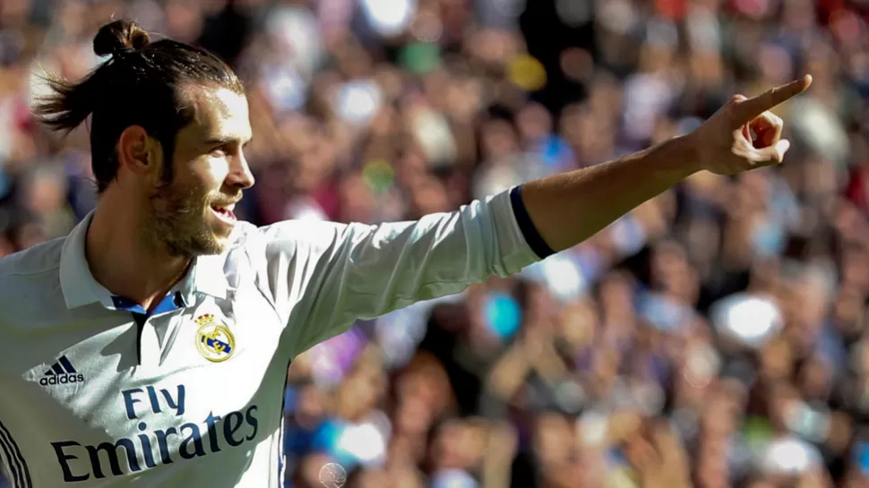 DE FESTEJO. Bale celebró así la extensión de su contrato hasta 2022. REUTERS