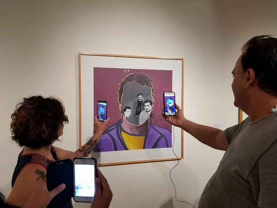“LOS REYES MAGOS”. En la pintura de Rolo Juárez, con los celulares, aparecen otras imágenes.  