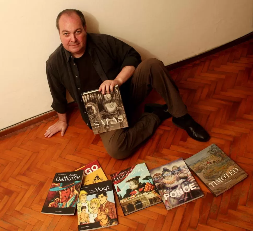 CATÁLOGO. Daniel Ferullo y algunos libros publicados por la editorial. foto de Gustavo Díaz Spólita