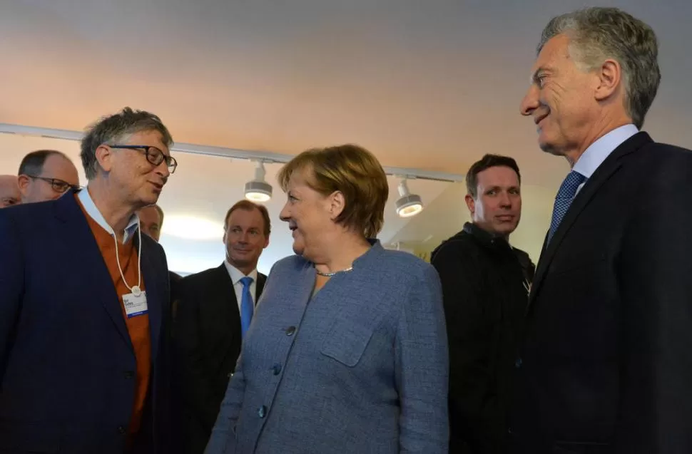 DIÁLOGO EN EL CAFÉ. Bill Gates y Ángela Merkel se reunieron con Mauricio Macri en la Casa Argentina y charlaron sobre inversiones y el G20. reuters 