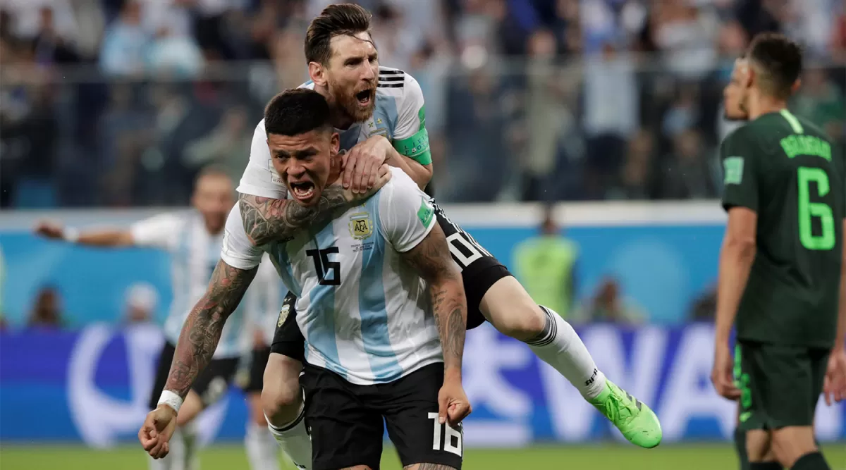 OTRA VEZ. Messi había hecho su último gol en Mundiales ante Nigeria, en Brasil. Ese día, también anotó Rojo, que festeja. REUTERS