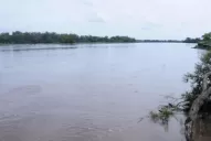 Lo hallan flotando en el río y con un balazo