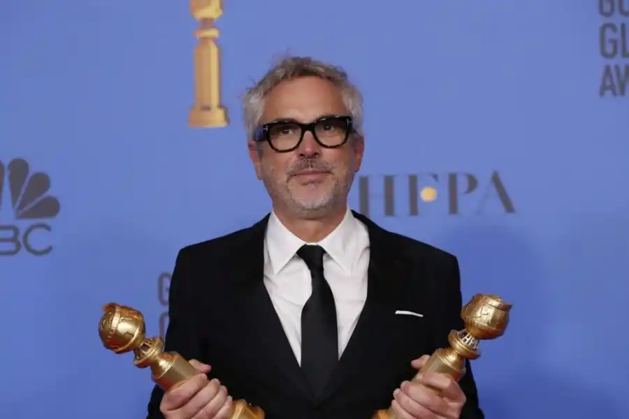 DOBLETE. Cuarón ganó a filme extranjero y a director. reuters 